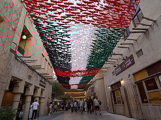 Al Seef in Dubai adorned with decorations marking the 54th Eid Al Etihad (UAE National Day).