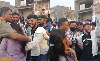 Saksham Tate (in white), Gajanan Mamidwar (left) holding his daughter Aanchal during Ambedkar Jayanti celebrations in April.