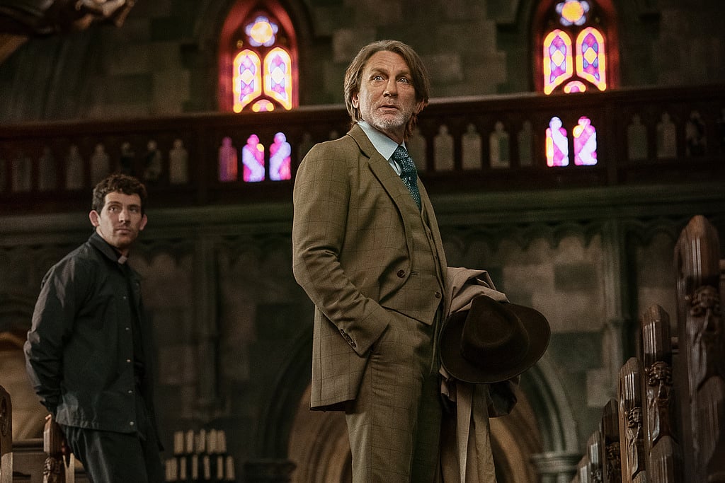 This image released by Netflix shows Josh O'Connor, left, and Daniel Craig in a scene from "Wake Up Dead Man: A Knives Out Mystery." (John Wilson/Netflix via AP)