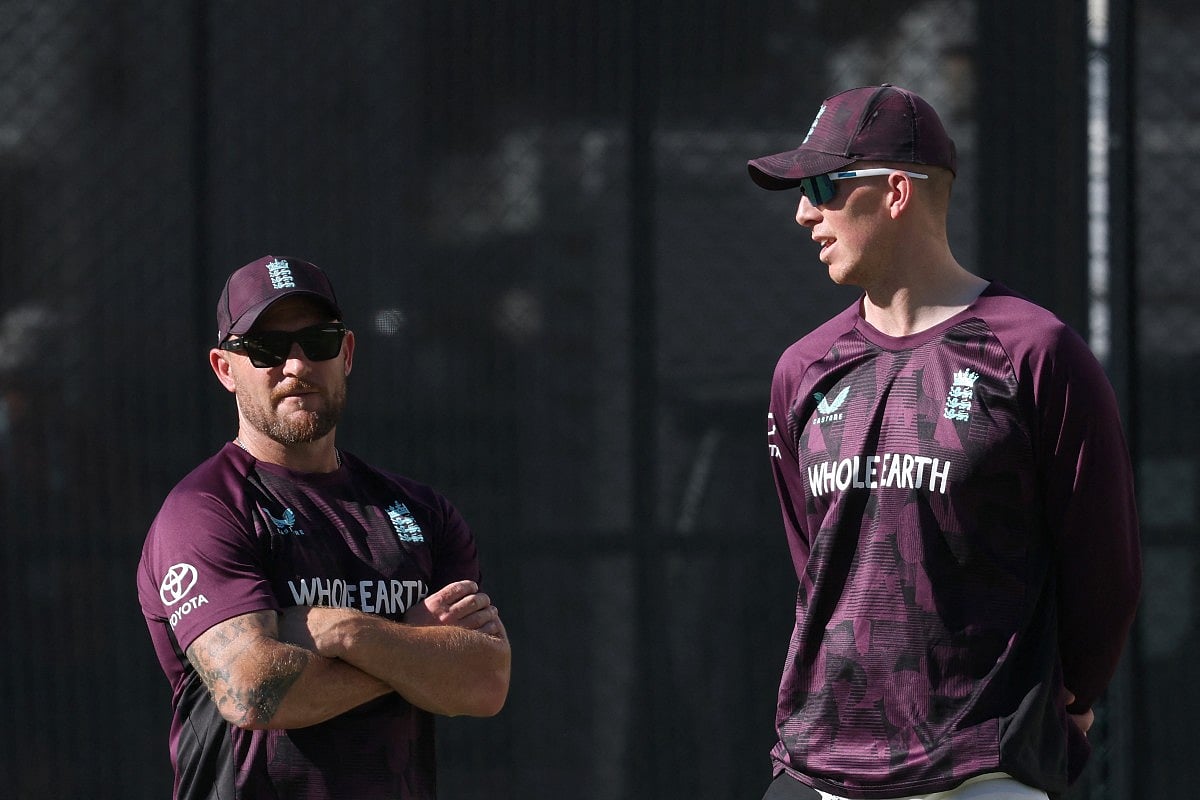 England's Zak Crawley (R) talks with head coach Brendon McCullum during a training session at The Gabba in Brisbane on December 2, 2025, ahead of the second Ashes cricket Test.