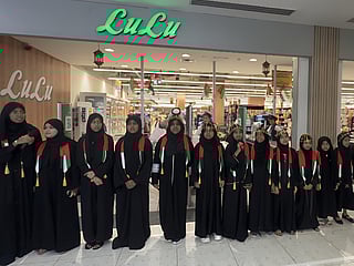 At exactly 11 am, shoppers paused as children, mostly girls, accompanied by their parents and LuLu Hypermarket staff, joined their voices in unison.