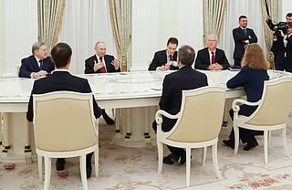 In this pool photograph distributed by the Russian state agency Sputnik, Russia's President Vladimir Putin, accompanied by Kremlin economic envoy Kirill Dmitriev and Kremlin aide Yuri Ushakov, meets with US special envoy Steve Witkoff and US President Donald Trump's son-in-law Jared Kushner at the Kremlin in Moscow on December 2, 2025.