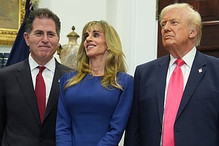 Michael Dell, left, his wife Susan and President Donald Trump listen during an event on "Trump Accounts" for kids in the Roosevelt Room of the White House, Tuesday, Dec. 2, 2025, in Washington. 