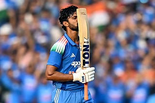 India's Ruturaj Gaikwad celebrates after scoring a century (100 runs) during the second one-day international (ODI) cricket match between India and South Africa at the Shaheed Veer Narayan Singh International Cricket Stadium in Raipur on December 3, 2025.