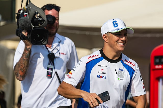 Red Bull Racing's French driver Isack Hadjar arrives for a press conference ahead of the Abu Dhabi Formula One Grand Prix at the Yas Marina Circuit in Abu Dhabi on December 4, 2025.