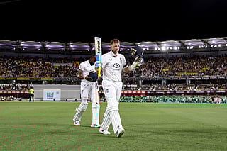 England's Joe Root walks off the ground at the end of day one of the second Ashes cricket Test match against Australia at The Gabba in Brisbane on December 4, 2025.