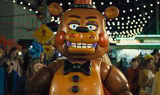 This image released by Universal Pictures shows Toy Freddy, voiced by Kellen Goff, in a scene from "Five Nights at Freddy's 2." 