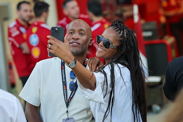 A fan takes a selfie during the paddock walk at the Yas Marina Circuit at the Formula 1 Etihad Airways Abu Dhabi Grand Prix 2025.