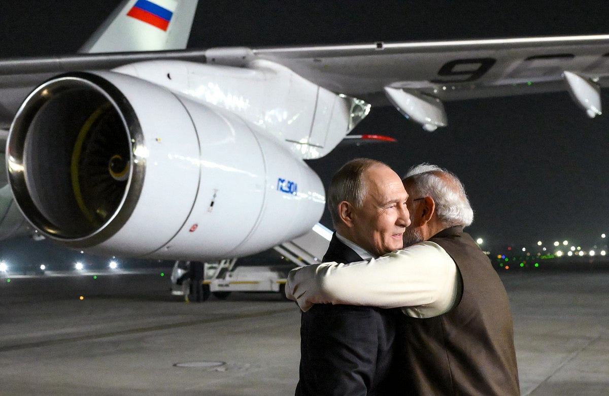 Putin is welcomed by Indian Prime Minister Narendra Modi upon the Russian leader's arrival at Palam Air Force Base in New Delhi on December 4, 2025, the first day of his two-day state visit to India.