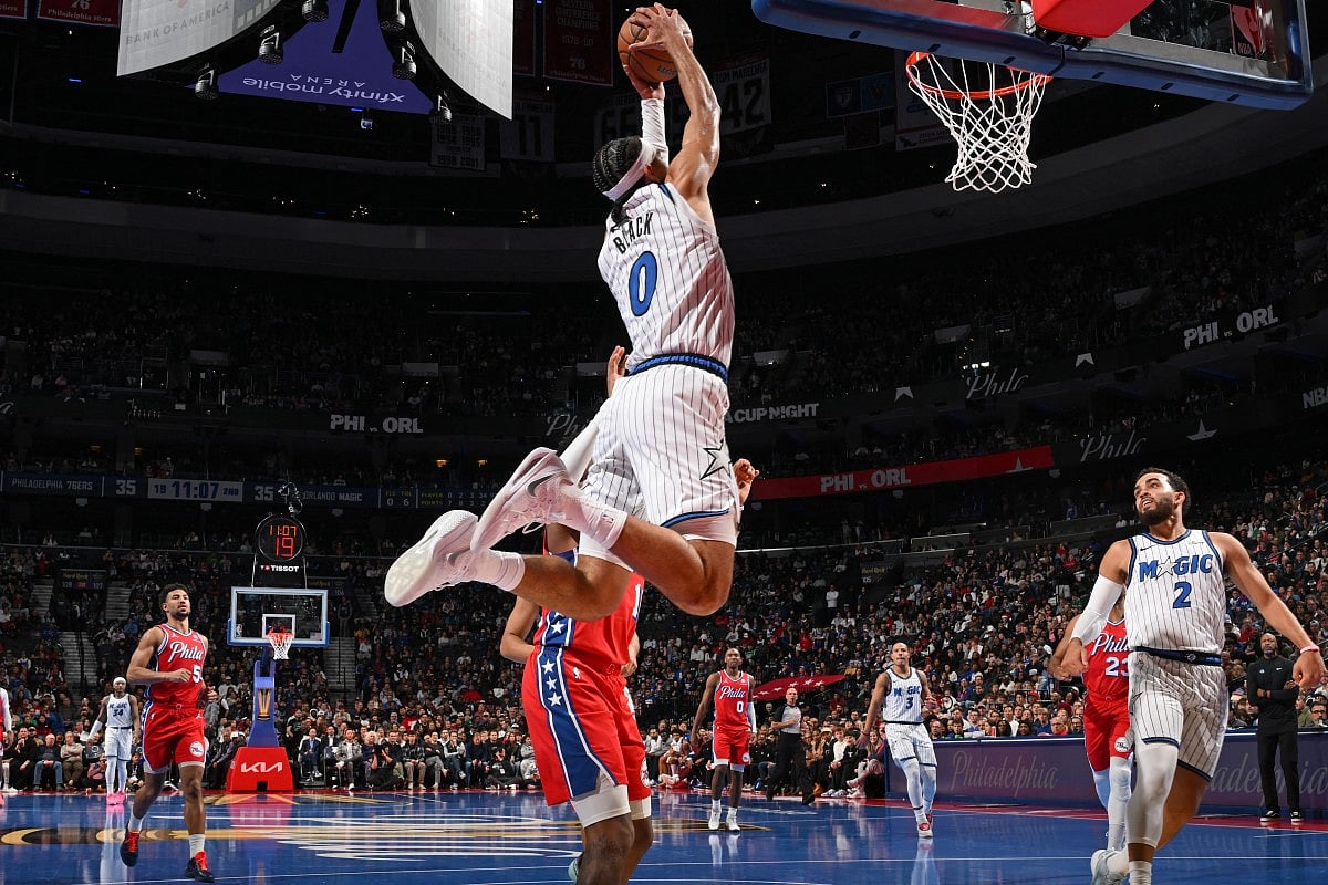 Anthony Black of the Orlando Magic dunks the ball during the game against the Philadelphia 76ers during the 2025-26 NBA Emirates Cup on November 25.
