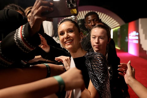 Candian actress Nina Dobrev arrives during the opening ceremony of the fifth edition of the Red Sea Film Festival in Jeddah on December 4, 2025.