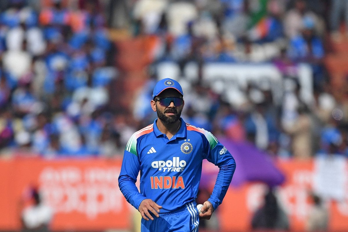 India's Virat Kohli looks on during the third one-day international (ODI) cricket match between India and South Africa at the Y.S. Rajasekhara Reddy Cricket Stadium in Visakhapatnam on December 6, 2025.