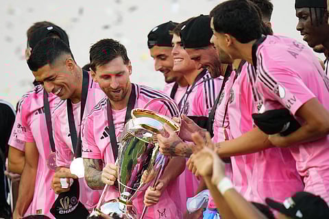 Lionel Messi #10 of Inter Miami CF and teammates hold the Champion's trophy after the Audi 2025 MLS Cup Final match between Inter Miami CF and Vancouver Whitecaps FC at Chase Stadium on December 06, 2025 in Fort Lauderdale, Florida.