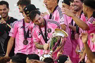 Lionel Messi #10 of Inter Miami CF holds the Champion's trophy after the Audi 2025 MLS Cup Final match between Inter Miami CF and Vancouver Whitecaps FC at Chase Stadium on December 06, 2025 in Fort Lauderdale, Florida.