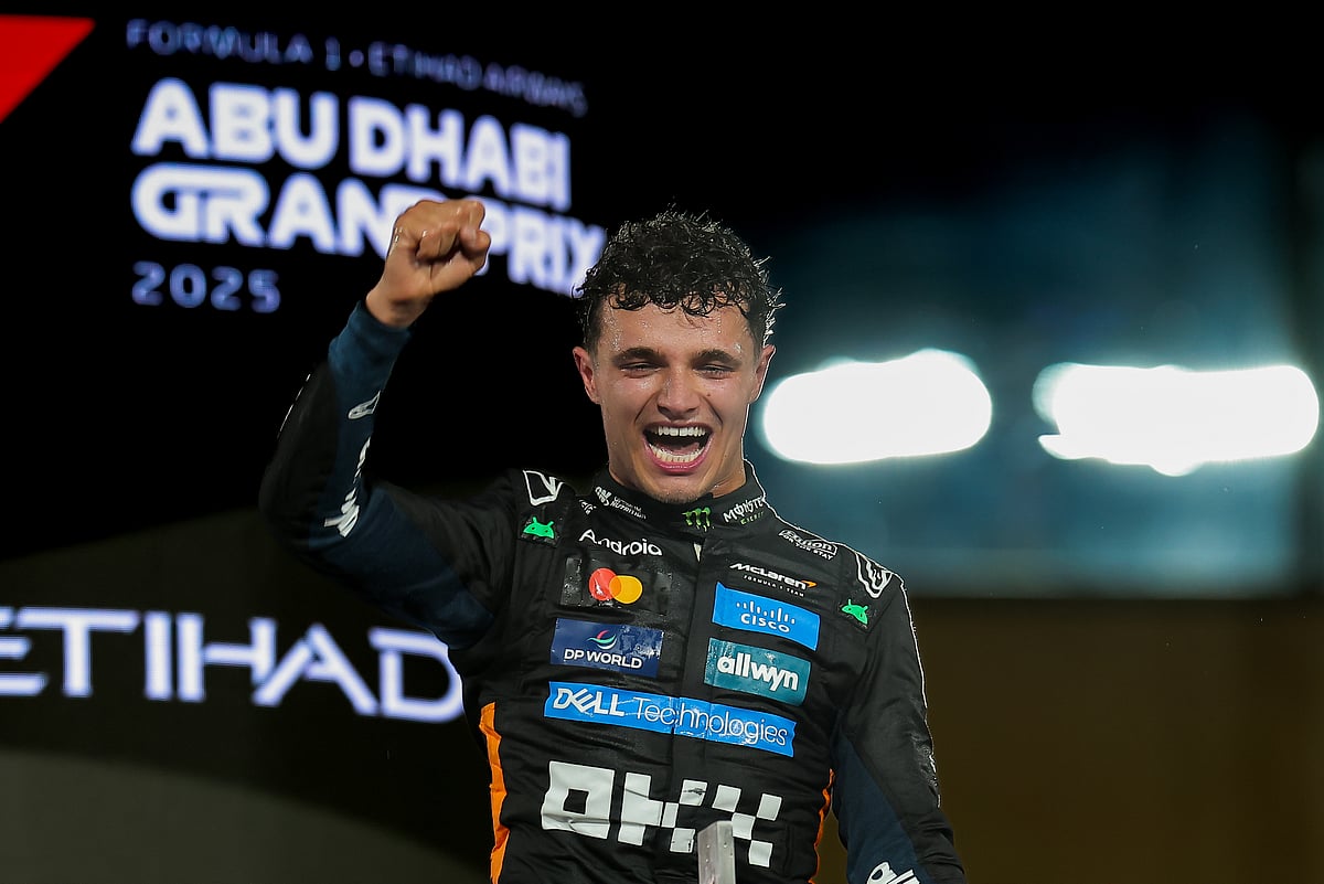 McLaren's Lando Norris celerbrate after winning his first Formula 1 drivers' championship with Abu Dhabi winner at the Formula 1 Etihad Airways Abu Dhabi Grand Prix 2025.