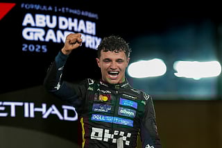 McLaren's Lando Norris celerbrate after winning his first Formula 1 drivers' championship with Abu Dhabi winner at the Formula 1 Etihad Airways Abu Dhabi Grand Prix 2025.