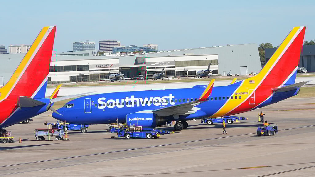 A Southwest Airlines jet pulls into a gate at Dallas Love Field Airport. File photo taken on Tuesday, Nov. 11, 2025, in Dallas, Texas.