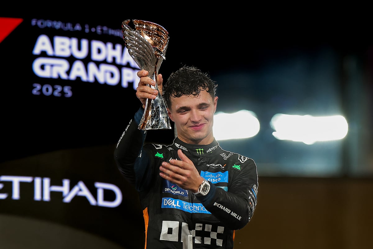 McLaren's Lando Norris celebrate after winning his first Formula 1 drivers' championship with Abu Dhabi winner at the Formula 1 Etihad Airways Abu Dhabi Grand Prix 2025 on Sunday.