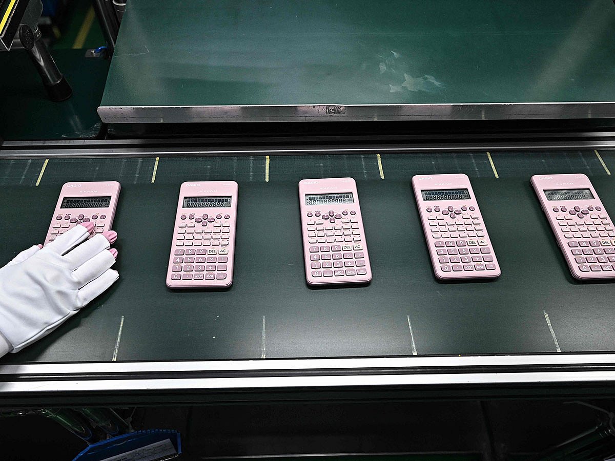 Workers assembling calculators at the Casio factory in Thailand's Nakhon Ratchasima province.
