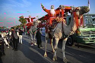 Santas race, ski and ride camels as Christmas nears