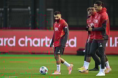 Liverpool's Egyptian striker #11 Mohamed Salah (C) attends a team training session at their training ground in Kirkby, Liverpool, north-west England on December 8, 2025, on the eve of their UEFA Champions League, league phase football match against Inter Milan in Milan.