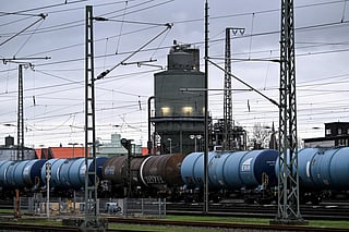 Railway tank cars with the logo of ERR European Rail Rent are pictured in an industrial area in Frankfurt am Main, western Germany, on December 8, 2025.