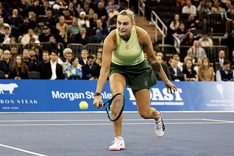 Aryna Sabalenka returns a shot to Naomi Osaka of Japan during the Garden Cup at Madison Square Garden on December 08, 2025 in New York City.