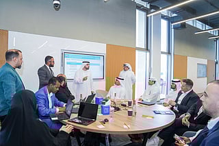 Participants at the RTA's Innovation Lab session explore cutting-edge applications of artificial intelligence and Internet of Things (IoT) technologies.