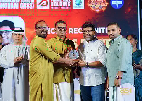 Kerala actor Niyas Backer (second right) receiving facilitation shield from Dubai-based businessman 
Firose Khan (2nd left) at the event in Dubai