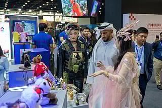 Sheikh Abdulla bin Mohamed bin Butti Al Hamed during his tour of the “ChinaJoy” pavilion at the BRIDGE 2025 Summit.