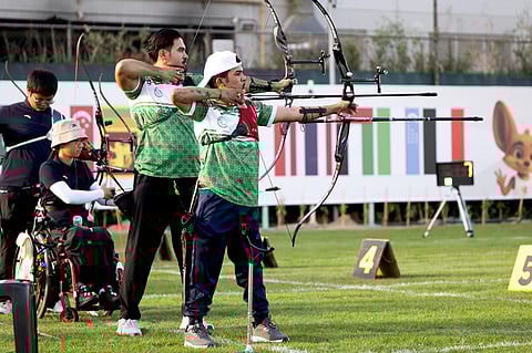 Iraq players practice at the archery venue for the Dubai 2025 Asia Youth Para Games.