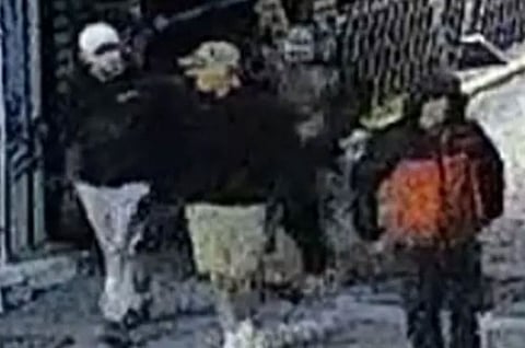 Police said they wanted to talk to four unidentified men, all wearing caps or hoodies, seen in the CCTV images carrying bags in the early hours.