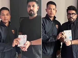  Saurabh and Gaurav Luthra with their hands tied  after they were arrested in Thailand.