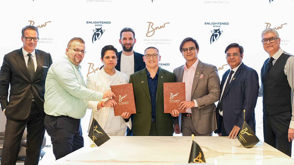 Ankur Aggarwal, Chairman and Founder of BNW Developments; Timur Kudratov, Co-founder of Enlightened Minds Investments; and Vivek Anand Oberoi, Managing Director and Co-founder of BNW Developments, with their teams at the signing ceremony