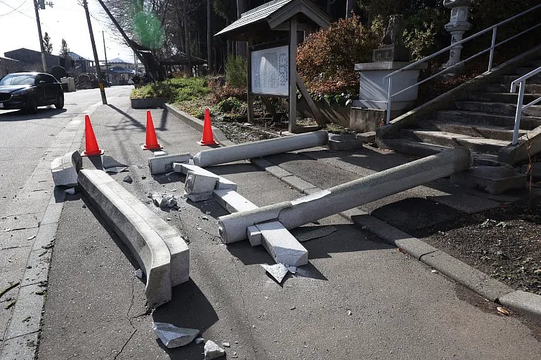 A torii gate at the entrance of Yasaka Shrine is seen after it collapsed in Hachinohe City in Aomori Prefecture, Japan, on December 9, 2025, following a 7.5 magnitude earthquake