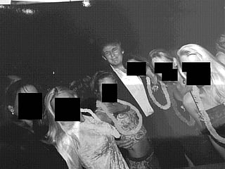 One of the released photos reportedly shows Trump posing with six women wearing leis, though their faces were redacted by committee members (Photo/X@OversightDems)