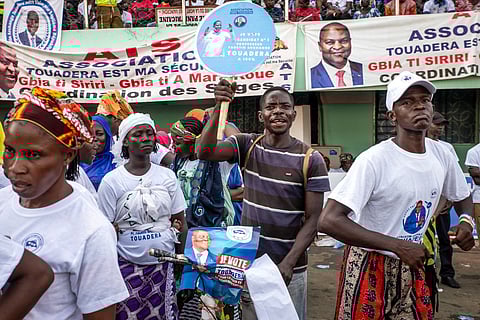 Supporters of the president of the Central African Republic and United Hearts Movement (MCU) presidential candidate Faustin-Archange Touadera gather during the launch of the electoral campaign in Bangui on December 13, 2025, ahead of the Central African Republic general elections scheduled for December 28, 2025.
