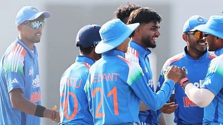 Indian players celebrate a Sri Lankan wicket.