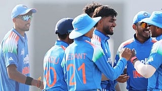 Indian players celebrate a Sri Lankan wicket.