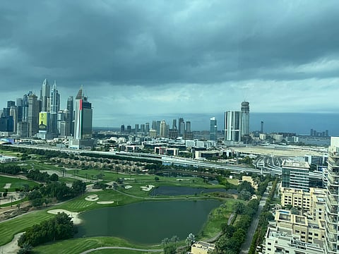 Taking photos while driving can leave you facing a fine of Dh800 and four black points.