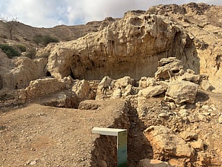Faya 1, where the collapsed remains of a massive rock shelter of hardened limestone stand as proof of the earliest human settlement in the area. 