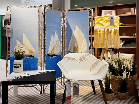 Muhra Al Muhairi has given an Emirati twist to IKEA's STILREN Vase, LAUTERS Floor Lamp, GRÖNSTA Chair with Arm rests, LACK Side Table, and TOLKNING Room Divider