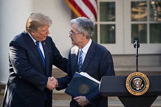 File photo of President Donald Trump shakes hands with his nominee for the chairman of the Federal Reserve Jerome Powell during a press event in the Rose Garden at the White House.