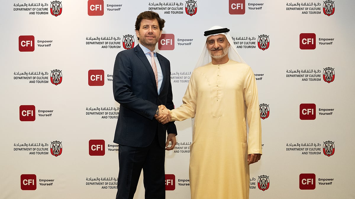 Ziad Melhem, Chief Executive Officer of CFI, with Saleh Mohammed Al Geziry, Director General for Tourism at DCT Abu Dhabi