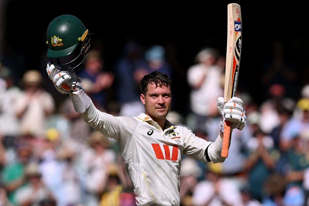 Australian batsman Alex Carey celebrates scoring a century on the first day of the third Ashes cricket Test match against England at the Adelaide Oval in Adelaide on December 17, 2025.