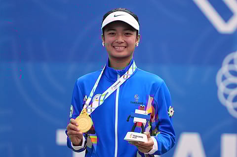Philippine Eala Alexandra pose with gold medals during medal ceremony for tennis the women's final at the Southeast Asian Games in Bangkok, Thailand, Thursday, Dec. 18, 2025.