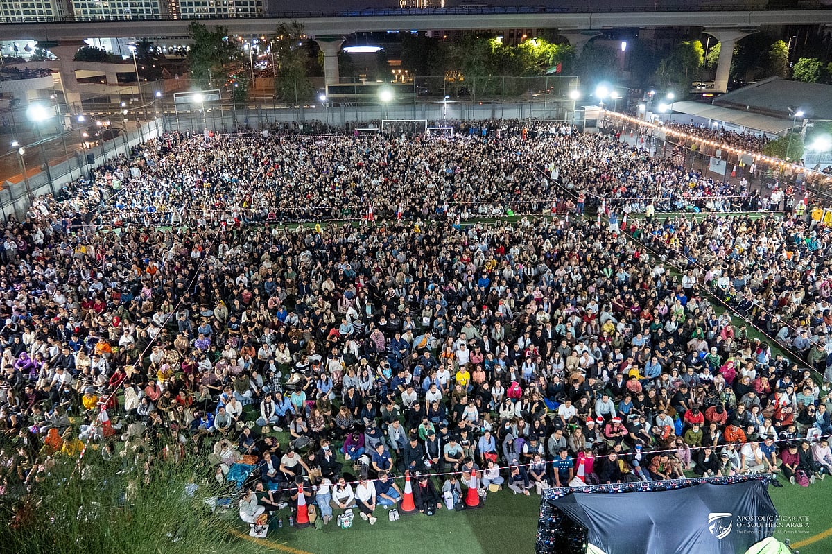 Filipino faithful at the Simbang Gabi pre-Christmas mass at St. Mary's Church on Tuesday. Nearly 30,000 people are said to have attended. 