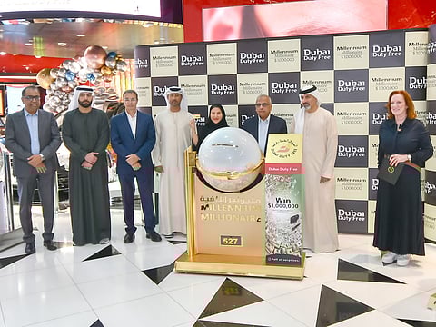 Dubai Duty Free officials announce the latest Millennium Millionaire winner.