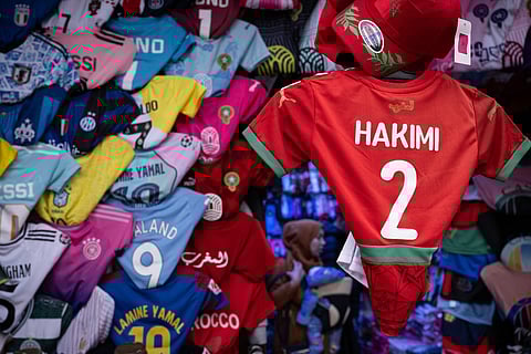 Morocco defender Achraf Hakimi's jersey is displayed in a shop in Rabat, on December 19, 2025, ahead of the Africa Cup of Nations (Afcon).