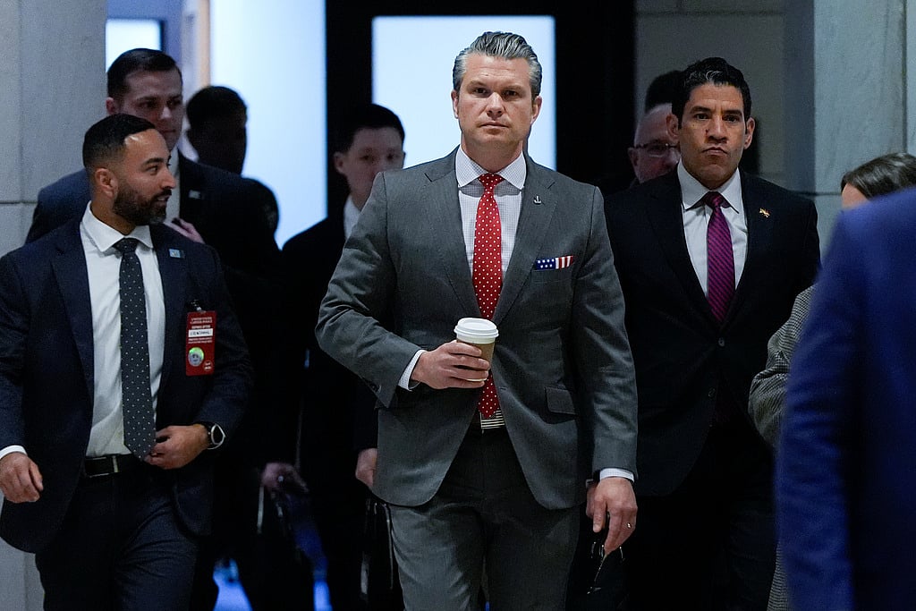 Defense Secretary Pete Hegseth arrives to brief members of Congress on military strikes near Venezuela, Tuesday, Dec. 16, 2025, at the Capitol in Washington. (AP Photo/Julia Demaree Nikhinson)